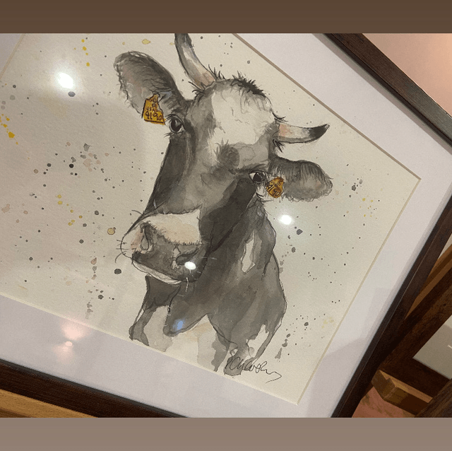 Original ‘Clara’ the cow A4 framed painting in dark wood frame 